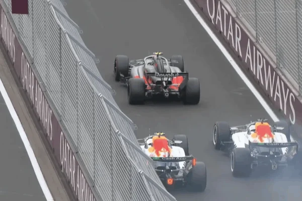 Scare in the pit lane: Lindblad narrowly avoids a collision with Lawson